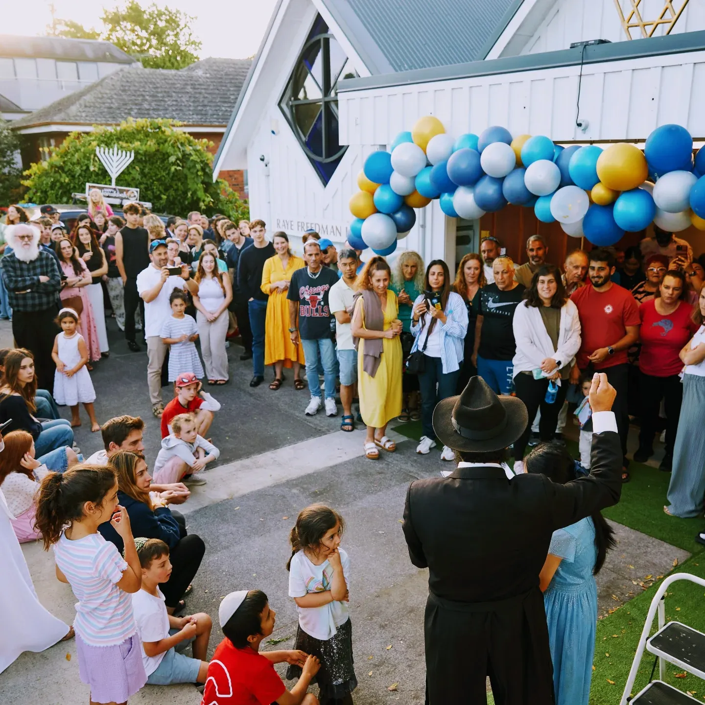 A crowd gathered outside the Raye Freedman Library building at 788 Remuera Road